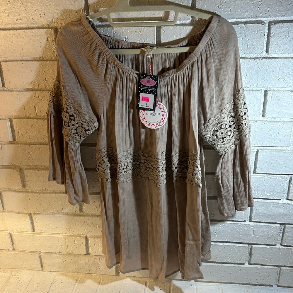 Beige off the shoulder blouse